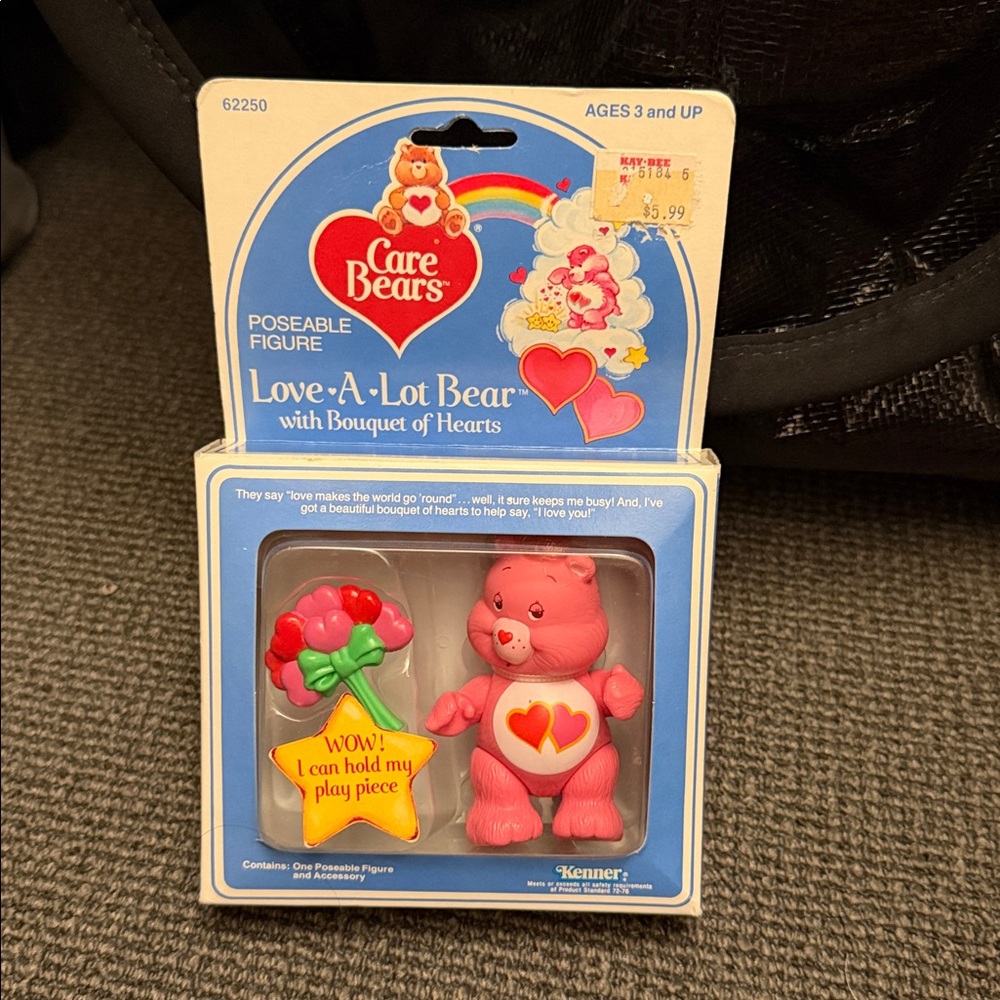 Vintage sealed 1983 Kenner Care Bears Love-a-Lot Bear with bouquet of hearts